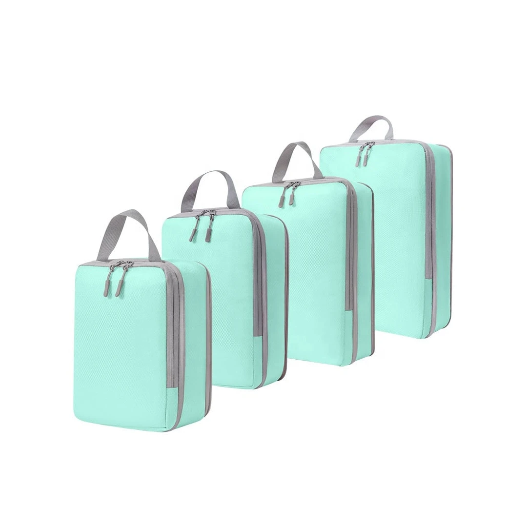 Organizatoare bagaj, TECOS, albastru deschis, sistem compresie/extensie cu fermoar, impermeabile, perfecte pentru troller sau valiza, 4 bucăți ALBASTRU DESCHIS - 