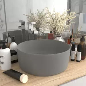 Chiuvetă baie lux gri deschis mat 40x15 cm ceramică rotund - Această chiuvetă rotundă, realizată din ceramică premium, este un element de decor ideal pentru baia, spălătorul sau toaleta dvs. Suprafața sa mată și...