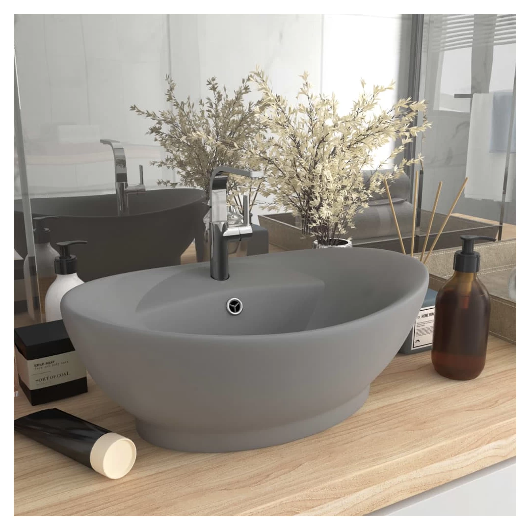 Chiuvetă lux cu preaplin gri deschis mat 58,5x39cm ceramic oval - Acestă chiuvetă de formă ovală, realizată din ceramică premium, este o completare elegantă pentru orice baie, spălător sau toaletă. Suprafața sa mată...