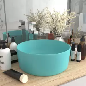Chiuvetă baie lux verde deschis mat 40x15 cm ceramică rotund - Această chiuvetă rotundă, realizată din ceramică premium, este un element de decor ideal pentru baia, spălătorul sau toaleta dvs. Suprafața sa mată și...