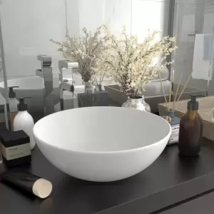 Chiuvetă de baie, alb mat, ceramică, rotund - Această chiuvetă rotundă, montată deasupra blatului, adaugă un stil contemporan oricărui decor de baie. Este, de asemenea, potrivită pentru camera de...