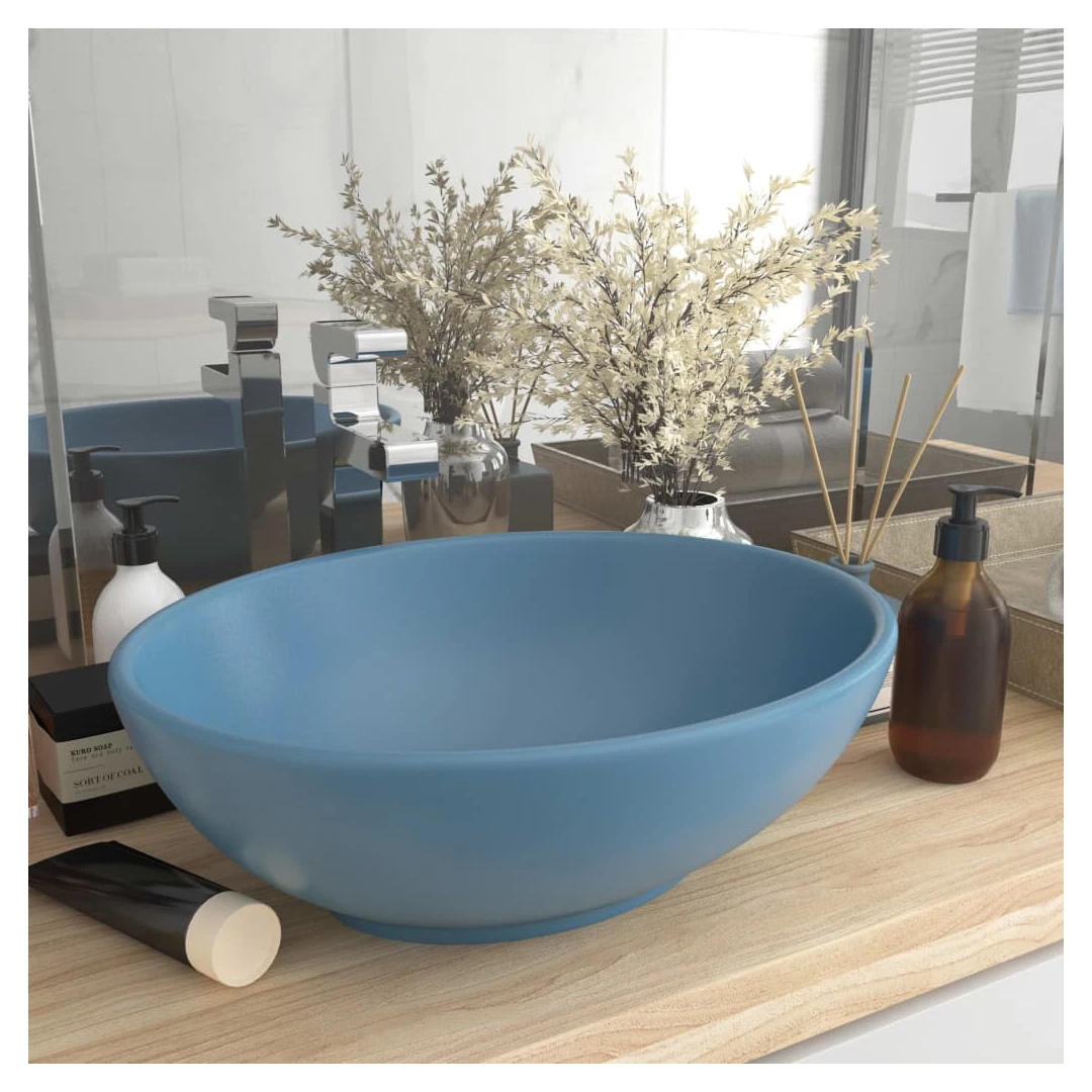 Chiuvetă de lux, albastru mat, 40x33 cm, ceramică, formă ovală - Acestă chiuvetă de formă ovală, realizată din ceramică premium, este un plus elegant pentru orice baie, toaletă sau budoar. Suprafața sa mată și desig...