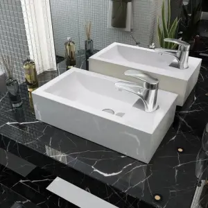 Chiuvetă ceramică dreptunghiulară cu preaplin 46x25,5x12 cm alb - Această chiuvetă de baie dreptunghiulară, din ceramică premium, va aduce un plus de eleganță pentru orice baie, toaletă sau budoar. Suprafața sa smălț...