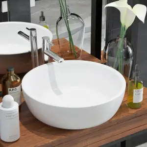 Chiuvetă de baie din ceramică, rotundă, 42 x 12 cm, alb - Această chiuvetă rotundă, din ceramică premium, va aduce un plus de eleganță în orice baie, toaletă sau budoar. Suprafața lucioasă contribuie la un de...
