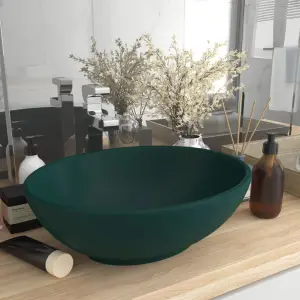 Chiuvetă de lux, verde mat, 40 x 33 cm, ceramică, formă ovală - Acestă chiuvetă de formă ovală, realizată din ceramică premium, este un plus elegant pentru orice baie, toaletă sau budoar. Suprafața sa mată și desig...