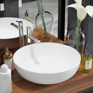 Chiuvetă de baie din ceramică, rotundă, 41,5 x 13,5 cm, alb - Această chiuvetă rotundă, din ceramică premium, va aduce un plus de eleganță în orice baie, toaletă sau budoar. Suprafața lucioasă contribuie la un de...