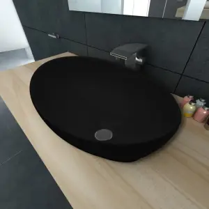 Chiuvetă ovală, negru, 40 x 33 cm, ceramică de lux - Această chiuvetă de baie ovală, realizată din ceramică premium, va deveni un element de decor elegant în orice baie, toaletă sau budoar. Finisajul său...