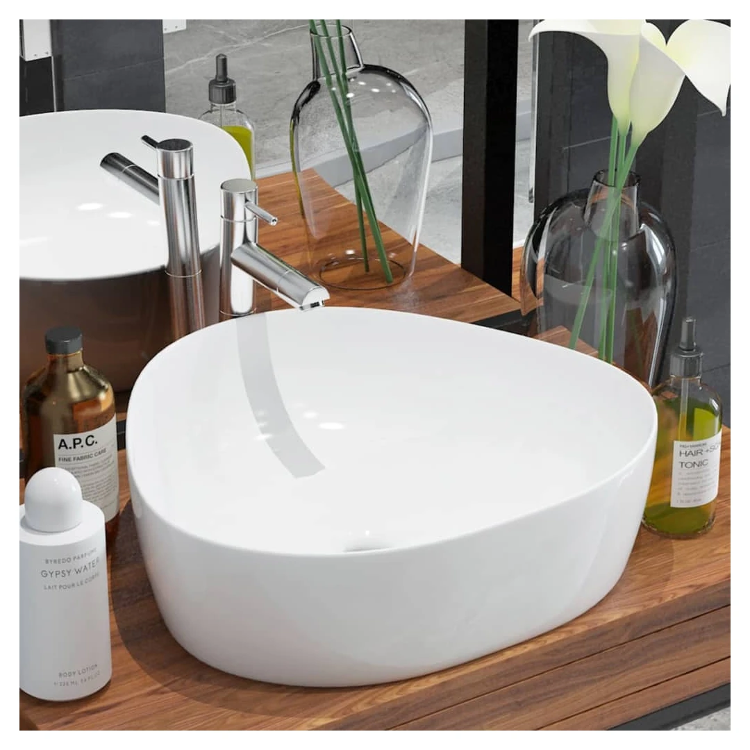 Chiuvetă baie din ceramică, triunghiulară, 50,5x41x12 cm, alb - Această chiuvetă de baie triunghiulară, din ceramică premium, va aduce un plus de eleganță pentru orice baie, toaletă sau budoar. Suprafața sa smălțui...